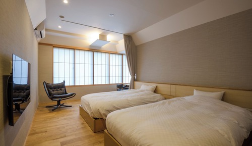 Habitación de lujo con 2 camas individuales