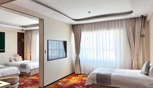 Habitación triple Deluxe, vistas a la ciudad