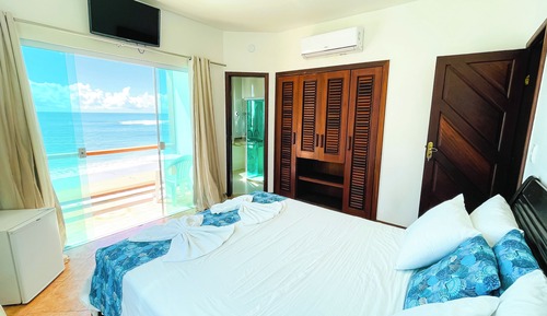 Habitación triple, vistas al mar
