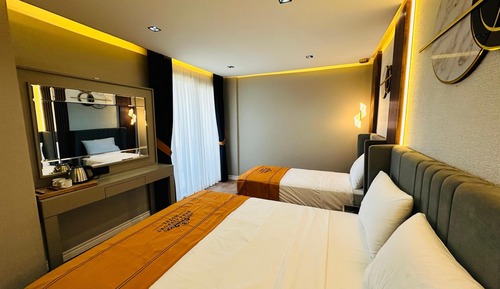 Habitación cuádruple Deluxe