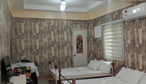 Habitación triple, vistas al jardín