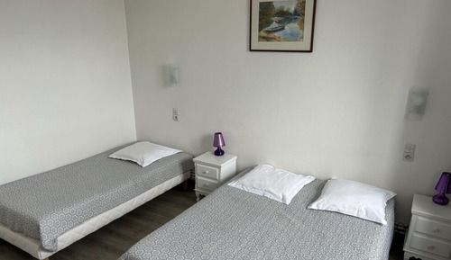 Habitación triple básica, varias camas