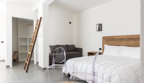 Habitación triple Deluxe, baño privado, vistas al jardín