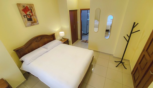 Habitación cuádruple Deluxe, vistas al patio