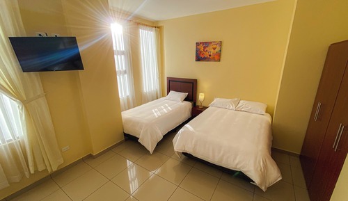 Habitación triple Deluxe, vistas al patio