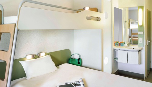 Habitación triple, varias camas