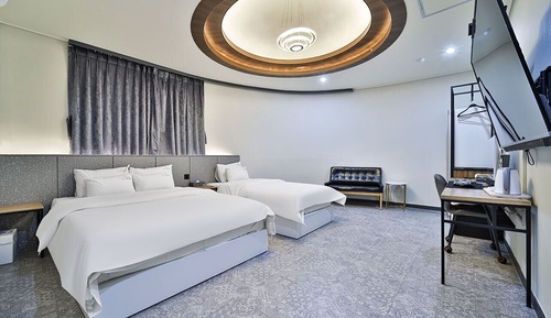 Habitación familiar con 2 camas individuales