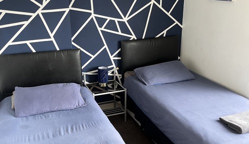 Habitación económica con 2 camas individuales, vistas al jardín