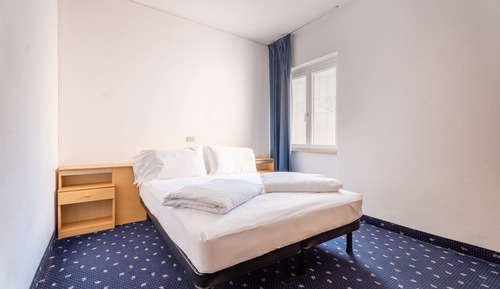 Habitación económica con 1 cama doble o 2 individuales