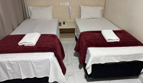 Habitación con 2 camas individuales