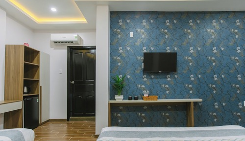 Habitación cuádruple Deluxe, no fumadores