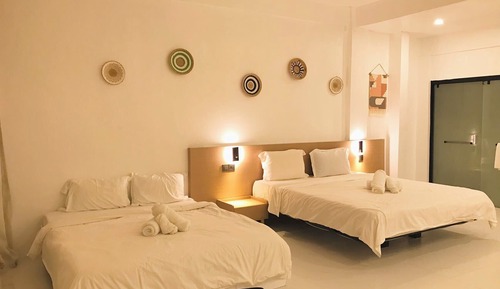 Habitación Deluxe, varias camas, vistas al jardín, en la zona del jardín