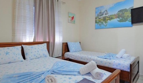 Habitación triple, balcón