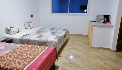 Habitación cuádruple Deluxe
