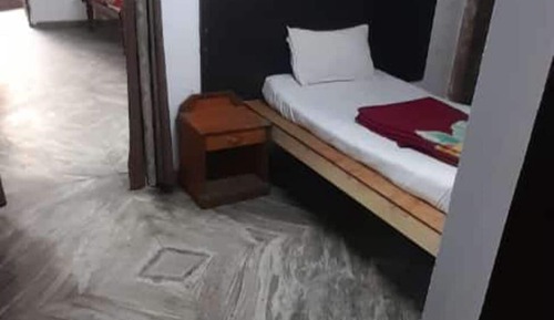Habitación familiar con 2 camas individuales