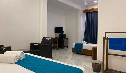Habitación triple Deluxe