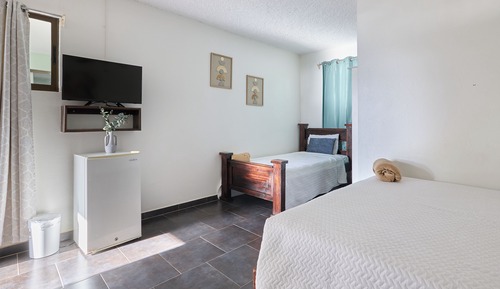 Habitación familiar doble, varias camas