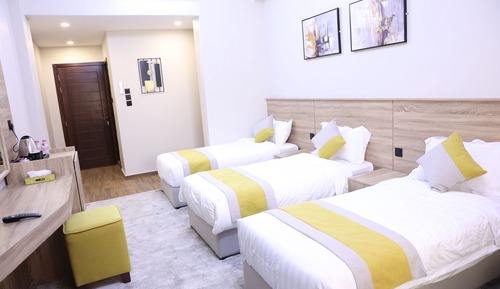 Habitación cuádruple Deluxe