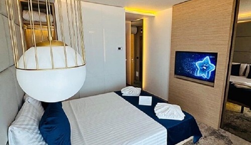Suite superior, 1 cama de matrimonio con sofá cama, vistas parciales al mar