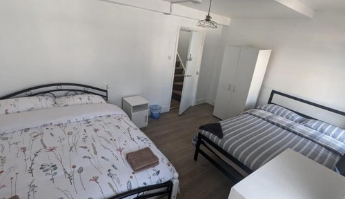 Habitación familiar, varias camas