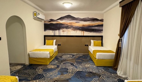 Habitación junior, varias camas
