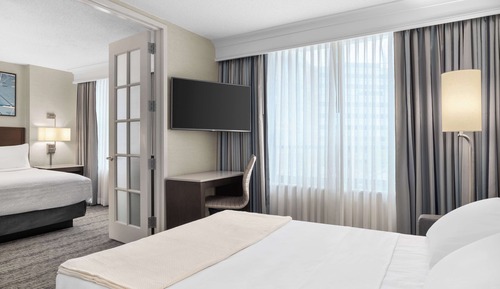 Suite, 1 cama de matrimonio grande con sofá cama, accesible para personas con discapacidad (Hearing)
