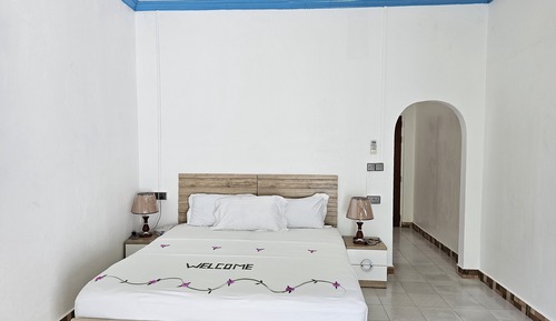 Habitación cuádruple familiar, varias camas, vistas al jardín, planta baja