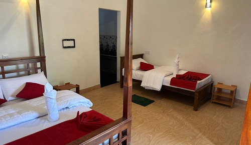 Habitación triple Deluxe