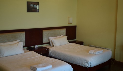 Habitación estándar con 1 cama doble o 2 individuales