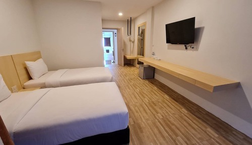 Habitación con 2 camas individuales, vistas a la ciudad