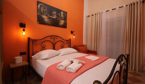 Suite estudio Deluxe, 1 cama de matrimonio con sofá cama, vistas al jardín