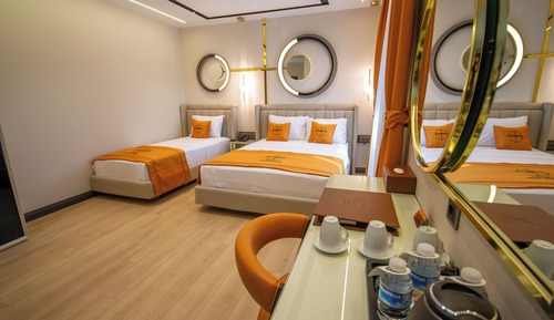 Habitación triple Deluxe
