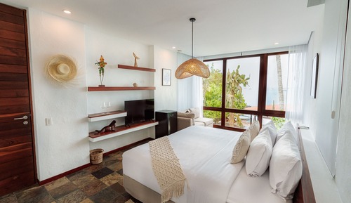 Habitación superior con 1 cama doble o 2 individuales, vistas al mar