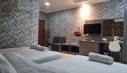 Habitación triple Deluxe