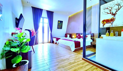 Habitación triple Deluxe
