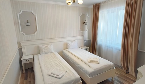 Habitación con 2 camas individuales