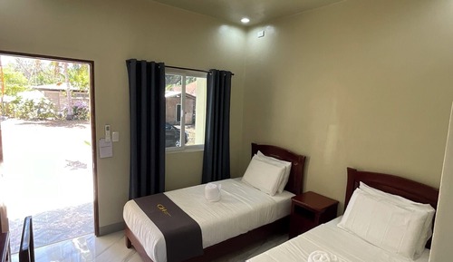 Habitación Premium con 1 cama doble o 2 individuales, vistas al jardín
