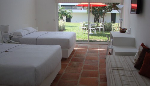 Habitación cuádruple superior, varias camas