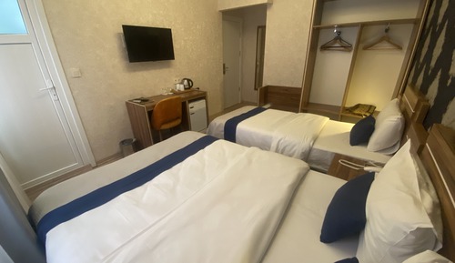 Habitación triple estándar, varias camas