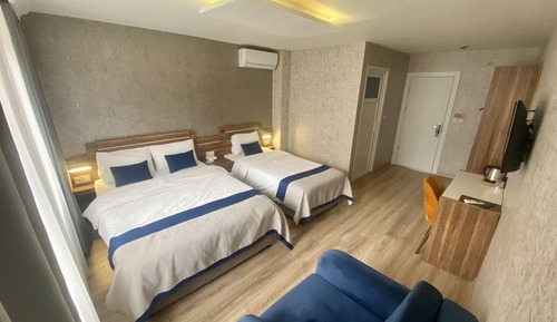 Habitación cuádruple Deluxe