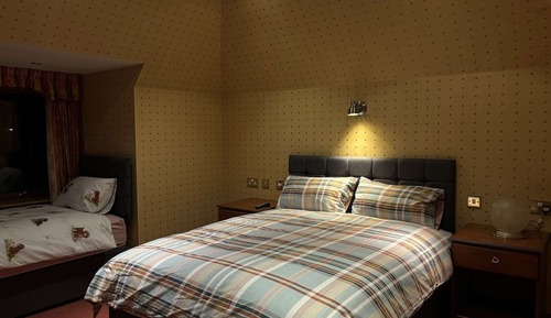 Habitación familiar con 1 cama doble o 2 individuales