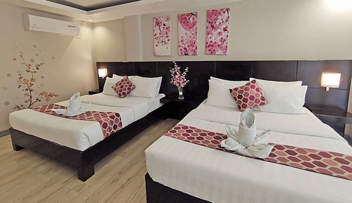 Habitación cuádruple Deluxe