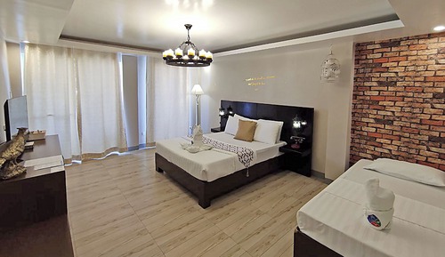 Habitación triple Deluxe