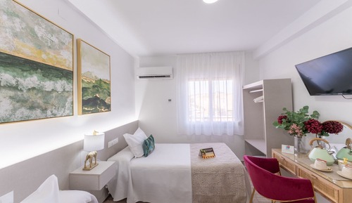 Habitación doble, varias camas