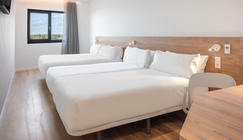 Habitación familiar, varias camas