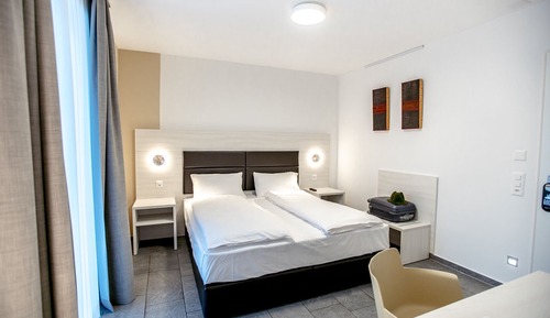 Habitación estándar con 1 cama doble o 2 individuales