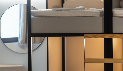 Dormitorio compartido Confort, varias camas