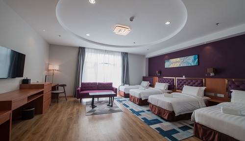 Habitación cuádruple Deluxe