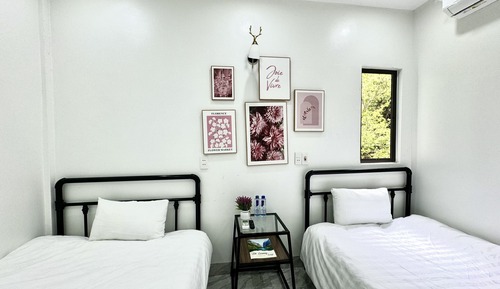Habitación básica con 2 camas individuales