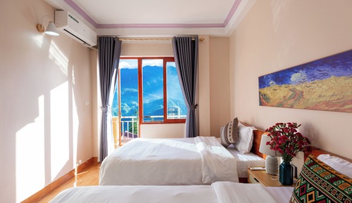 Habitación superior con 2 camas individuales, balcón, vistas a la montaña